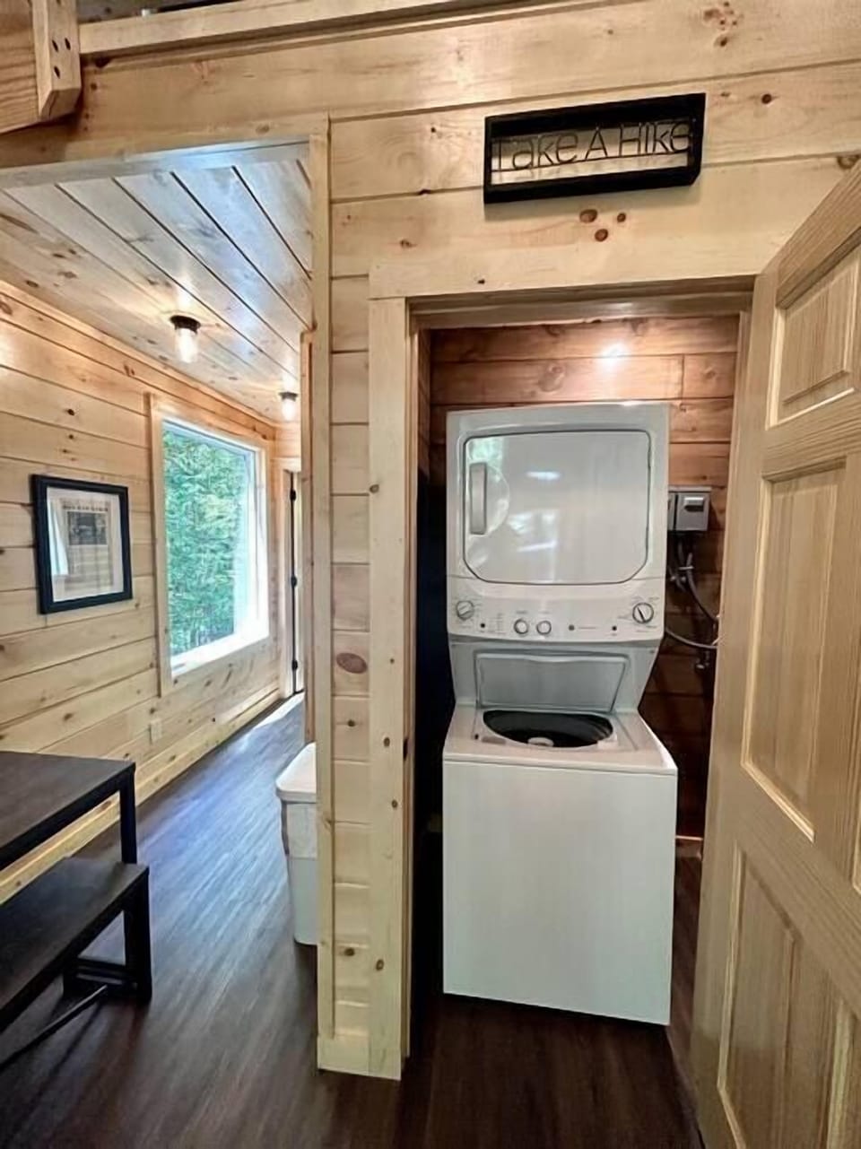 Laundry closet with washer and dryer. 