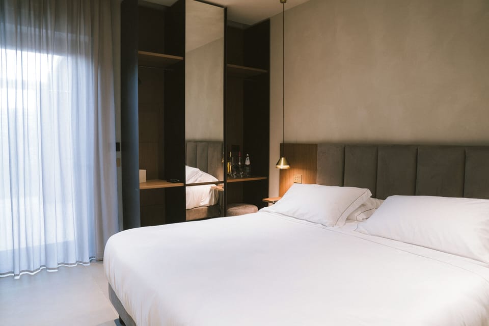 Luxury Suite | Premium bedding, down comforters, desk, soundproofing