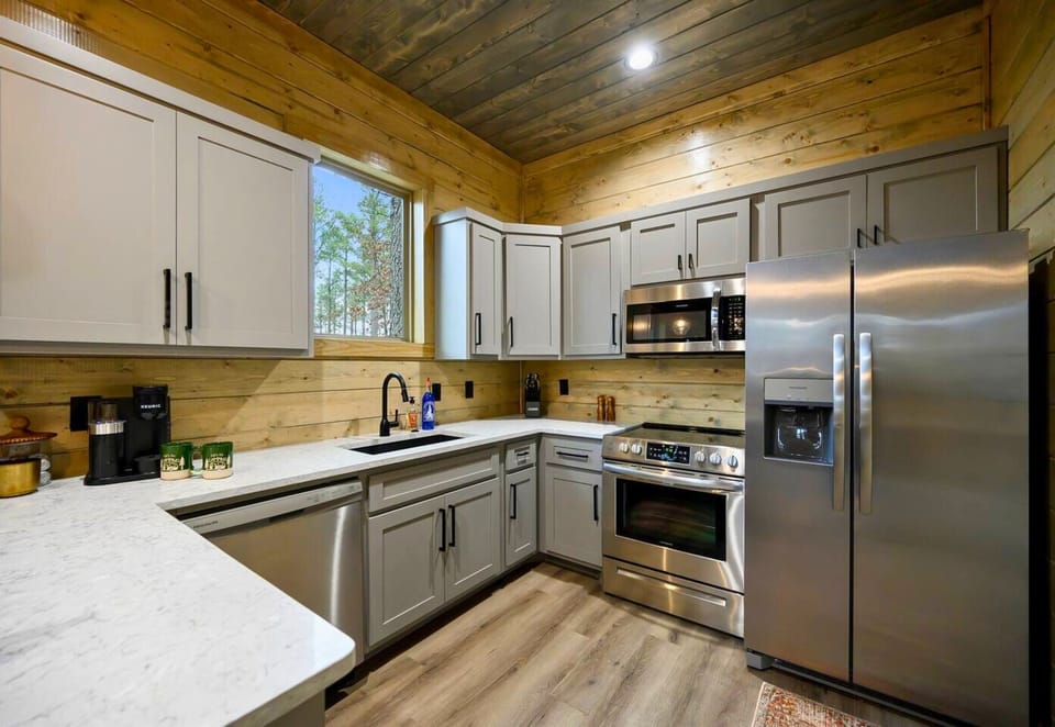 Enjoy modern appliances and plenty of counter space in this kitchen.