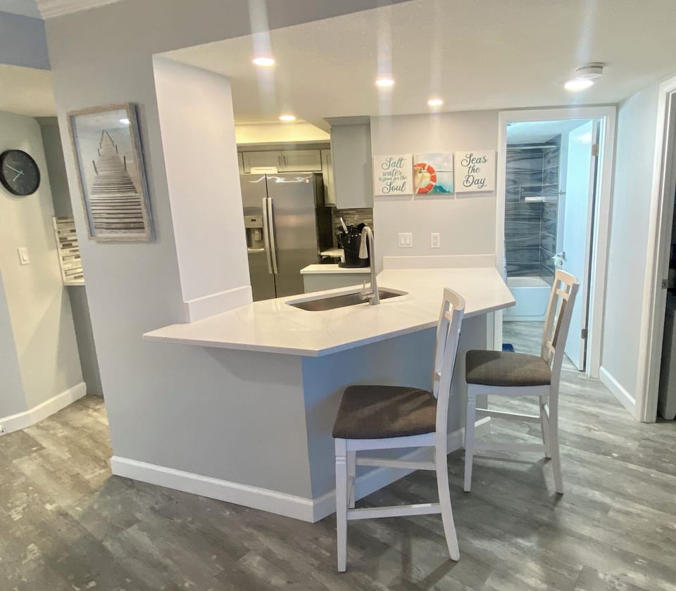 Beautifully remodeled open kitchen with breakfast bar and additional seating.