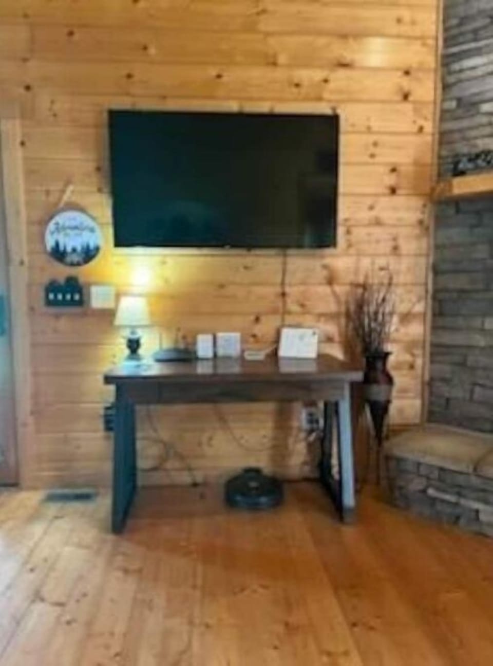 Smart tv with work desk and chair.