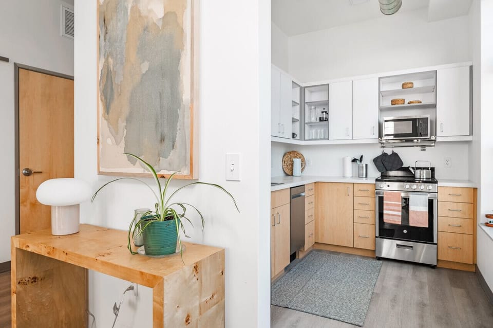 Sleek kitchen with high-end appliances for culinary adventures 🍳🍽️