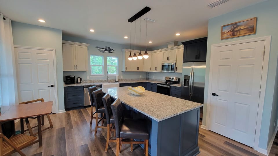 Kitchen with island and expanding table