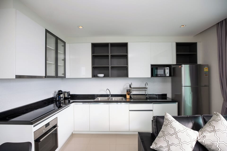 Deluxe Condo | Private kitchen | Electric kettle, toaster