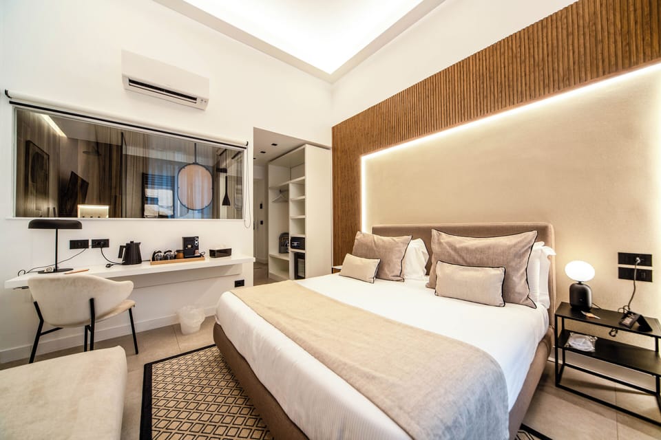 Premium bedding, down comforters, in-room safe, desk