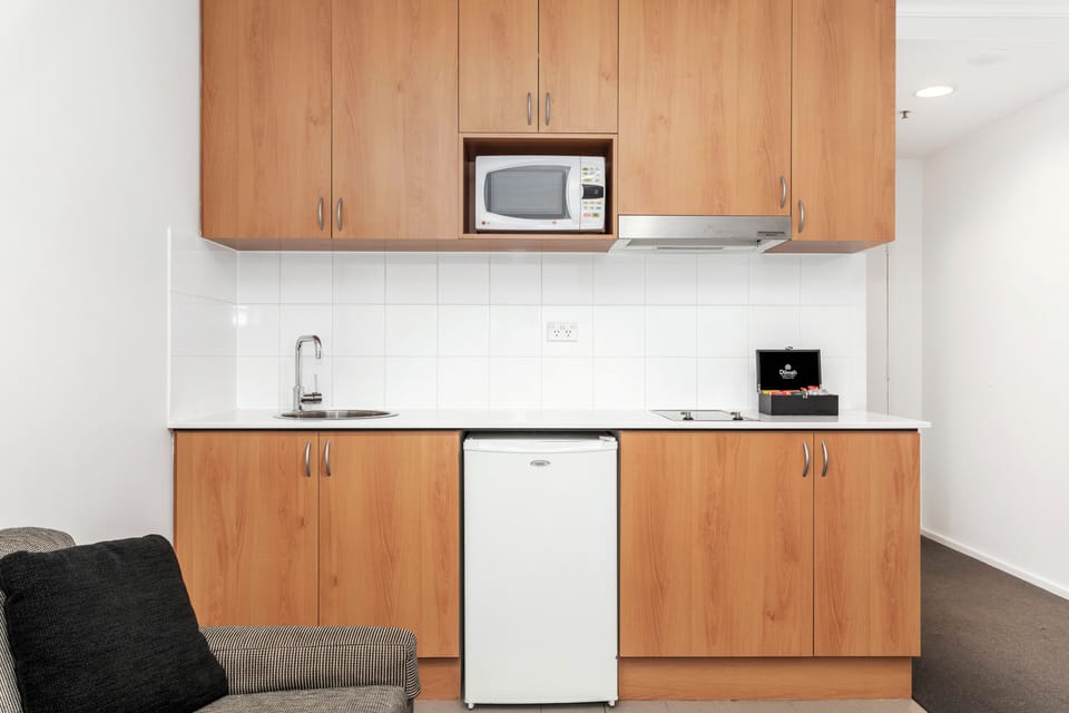 Featuring a kitchenette, instant coffee, tea, and sugar