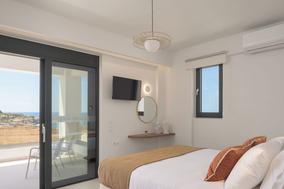 Welcoming bedroom features - direct access to balcony.