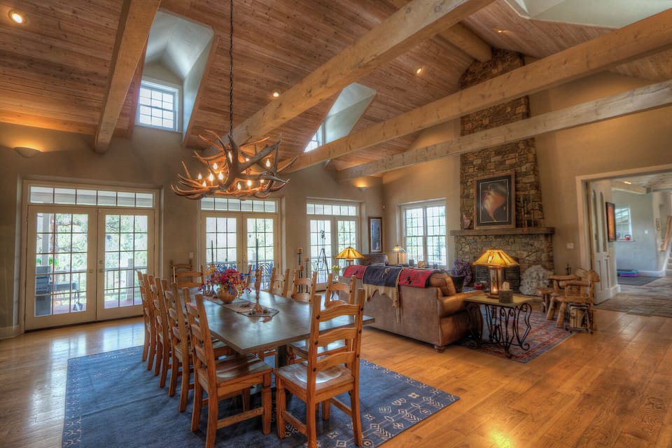 Main Living and Dining Spaces - Deck access and wood burning fireplace