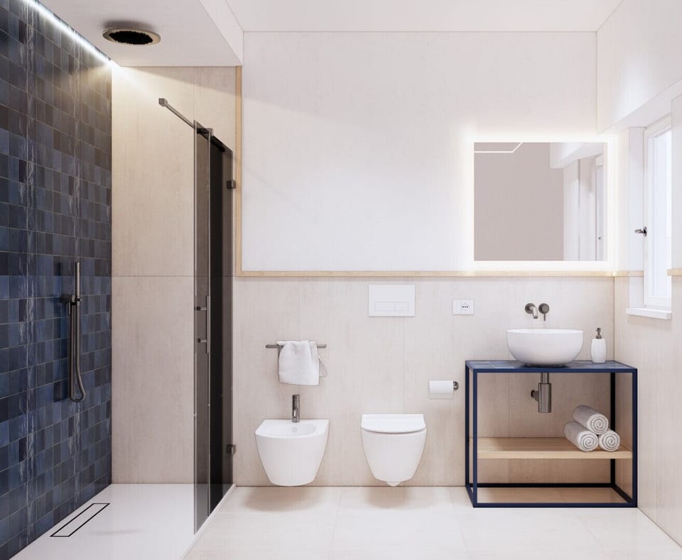 Separate tub and shower, rainfall showerhead, free toiletries