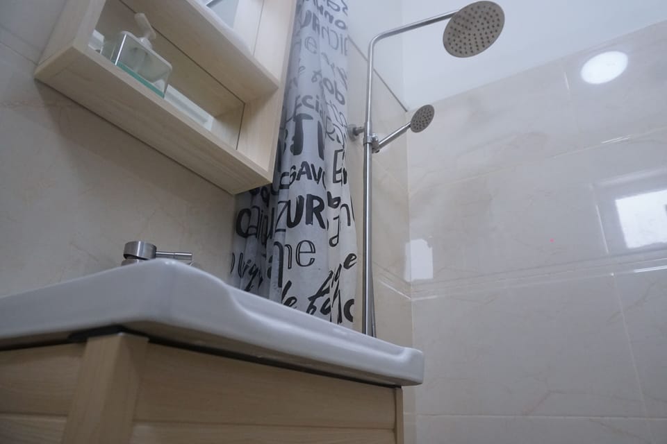 Shower, free toiletries, towels, soap