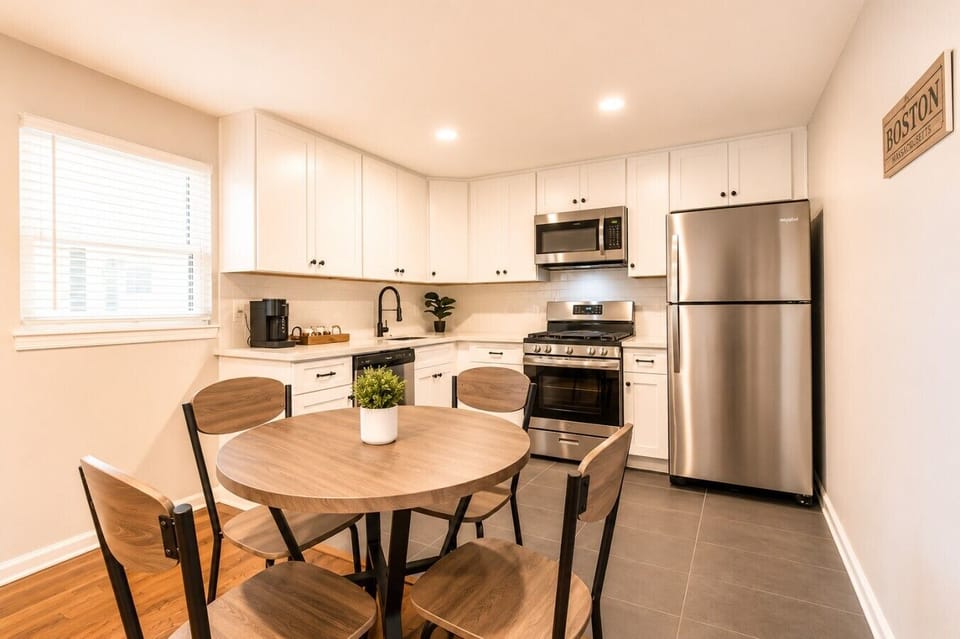 Bright and open kitchen with a cozy dining nook—great for meals at home.