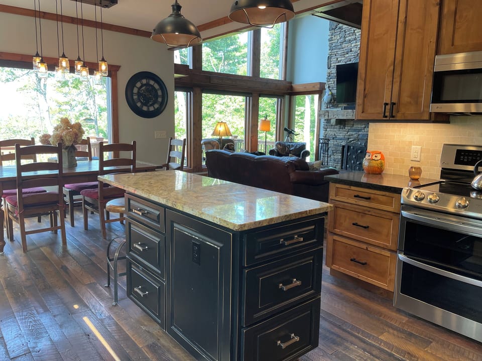 Kitchen looking into dining area and main floor living room 