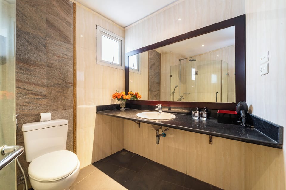 Deluxe Double or Twin Room | Bathroom | Designer toiletries, hair dryer, slippers, bidet
