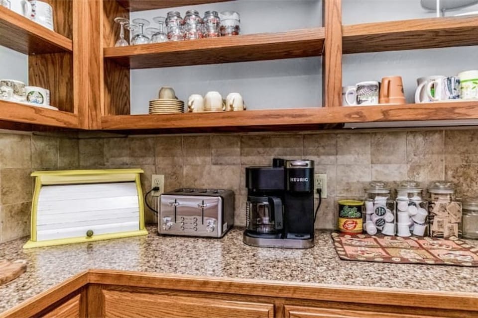 Pantry off the kitchen with a Keurig coffee machine.