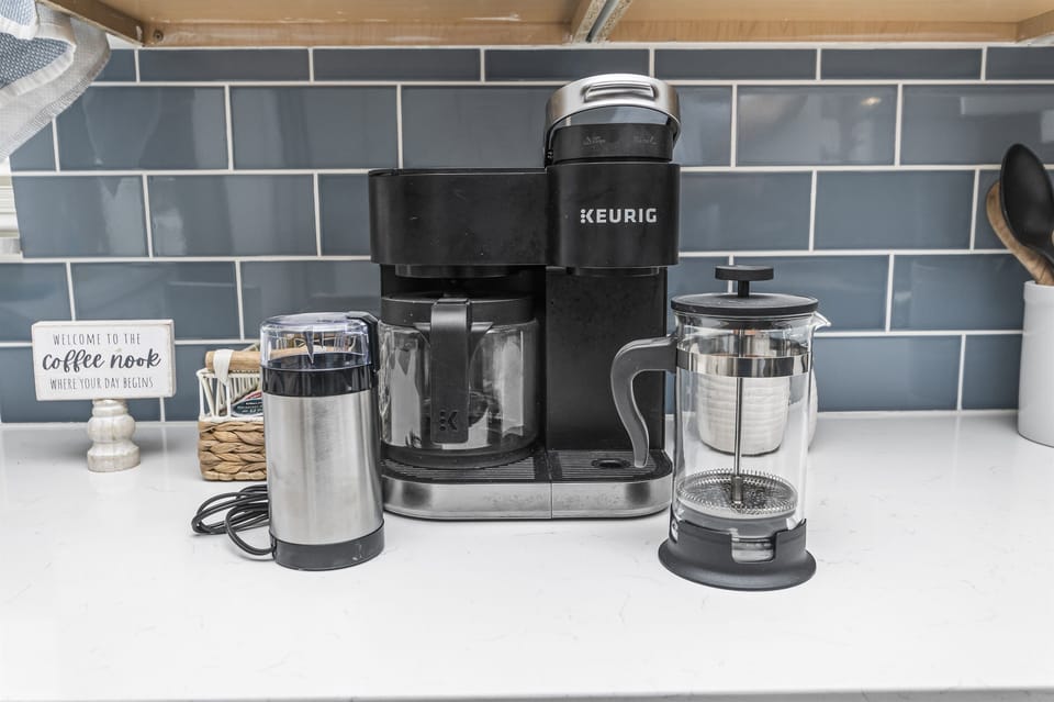 Start your relaxing beach day with fresh brewed coffee or tea, which we provide. There is also a bean grinder, french press, and milk frother. May take a little more time....but totally worth it!