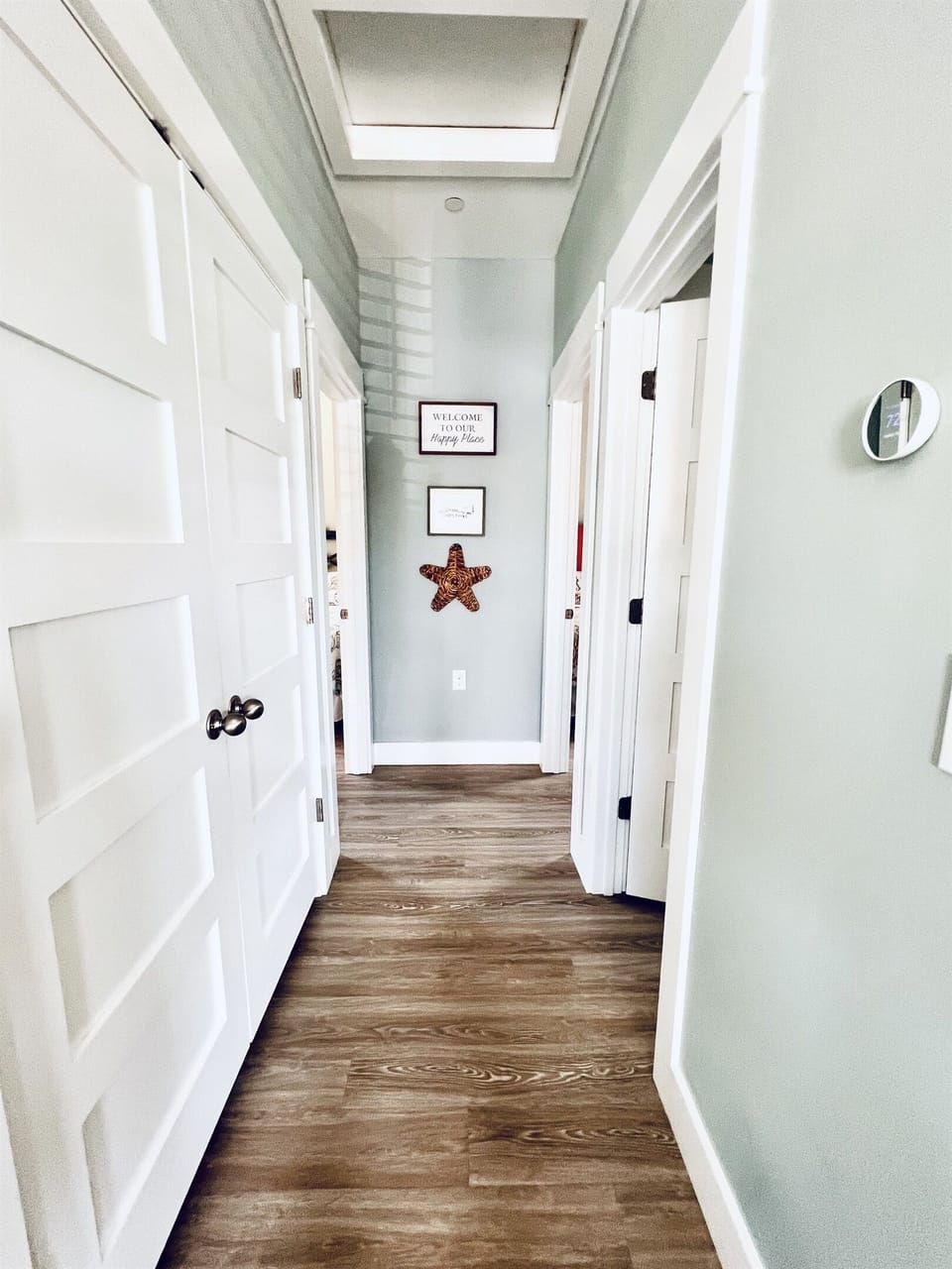 Hallway with brightened with sea décor.