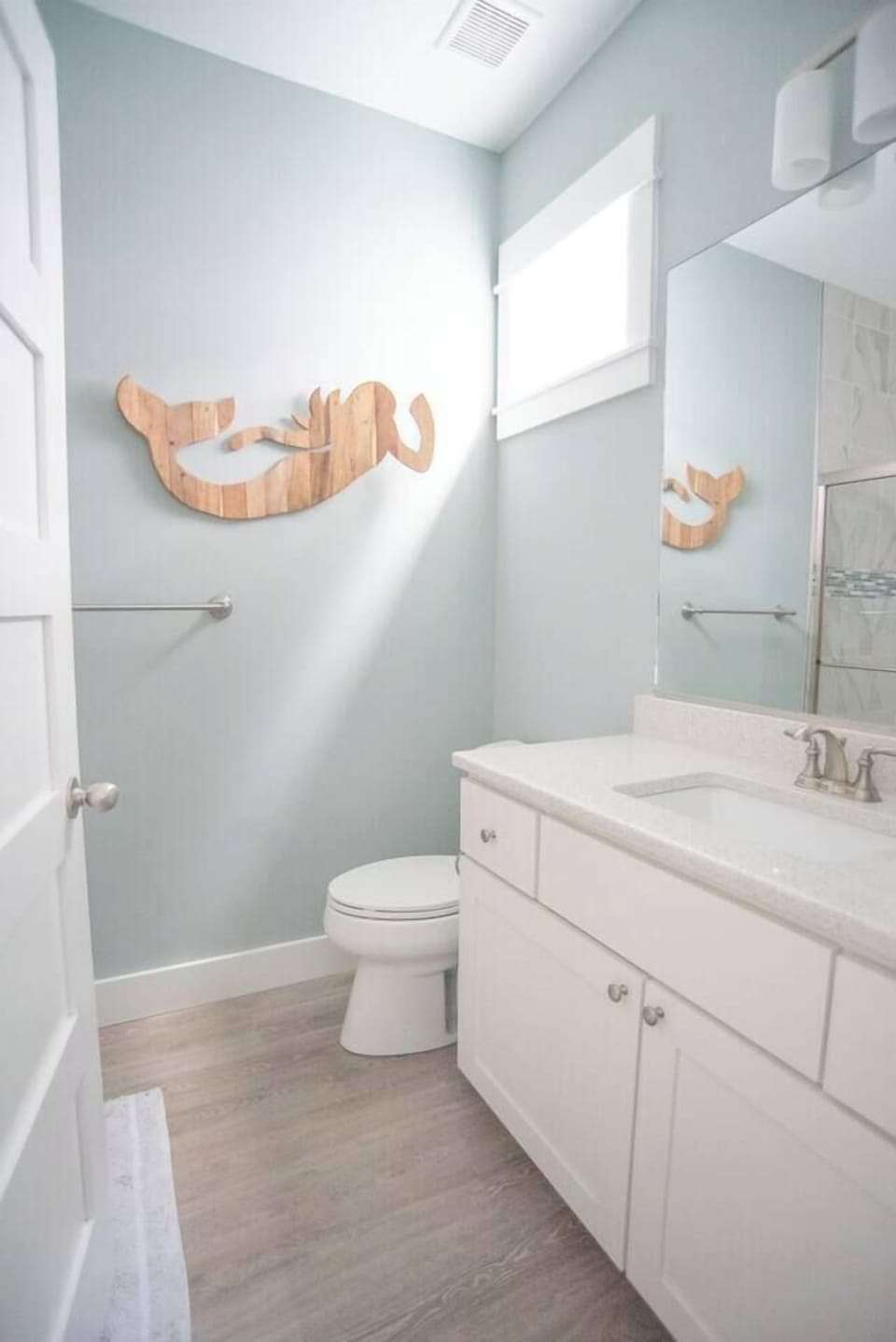 Elevate your daily routine in this exquisitely designed, white paradise.