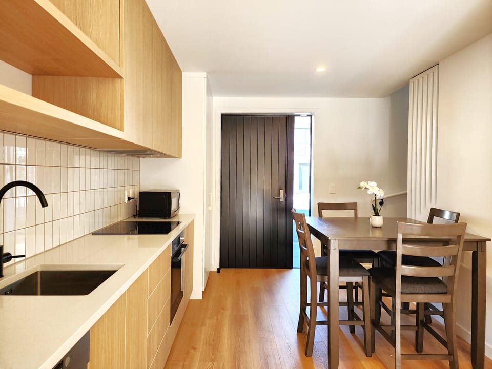 Signature Townhome | Private kitchen | Fridge, microwave, oven, stovetop