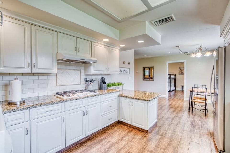 Inspire delightful meals and lively connection in your radiant kitchen.