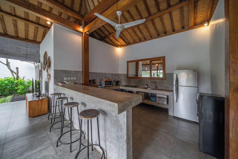 Luxury Villa | Private kitchen | Fridge, microwave, stovetop, electric kettle