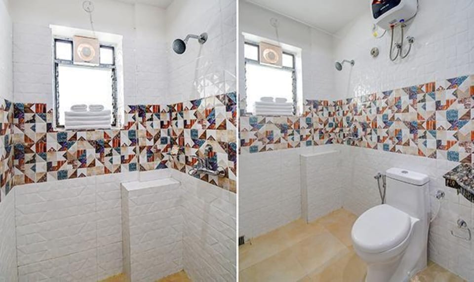 Deluxe Room | Bathroom | Shower, rainfall showerhead, free toiletries, towels