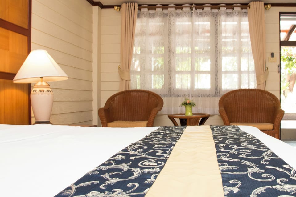 Deluxe Double Room, Pool View | In-room safe, free WiFi, bed sheets