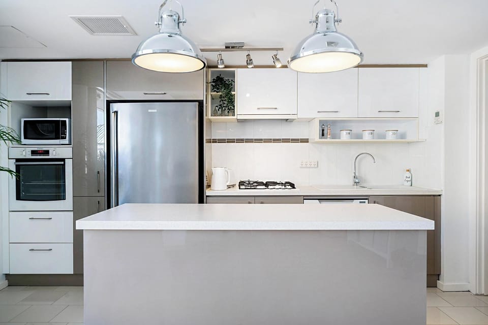 Fully equipped kitchen with island bench
