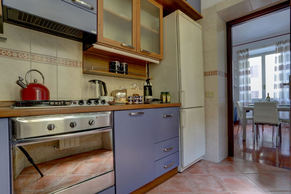 Deluxe Condo | Private kitchen | Full-size fridge, oven, stovetop, dishwasher