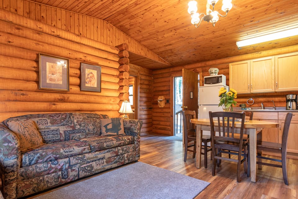 One Bedroom Cabin, King Bed | Living area | 32-inch flat-screen TV with cable channels, TV, streaming services