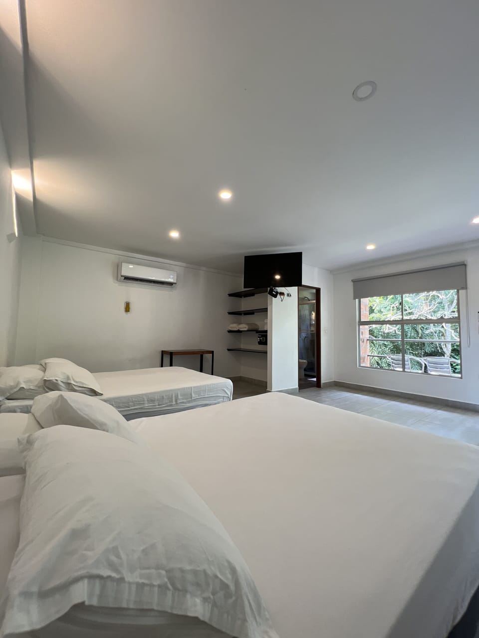 Premium Quadruple Room, 2 Double Beds | Premium bedding, blackout drapes, soundproofing, free WiFi