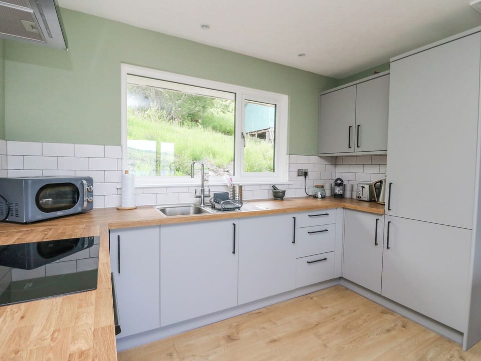 Fridge, electric kettle, toaster, cookware/dishes/utensils