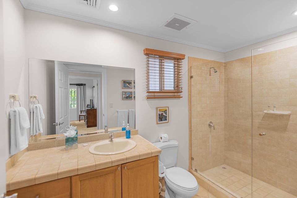 A well-appointed bathroom with modern fixtures and a fresh, clean design.