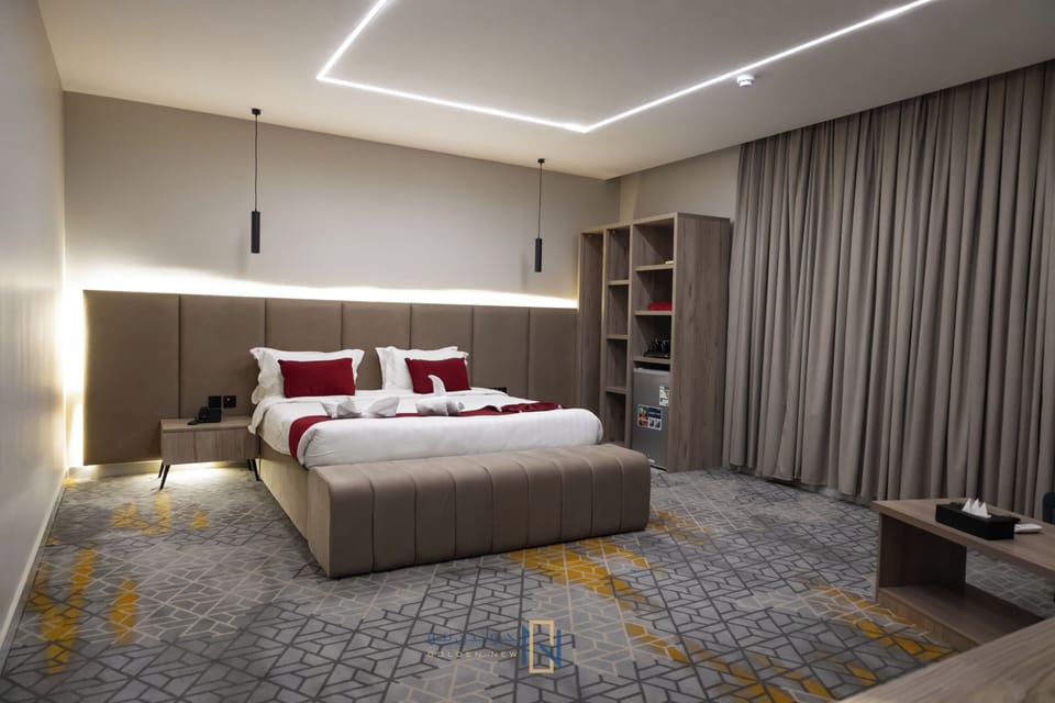 Minibar, iron/ironing board (on request), WiFi (free), bed sheets