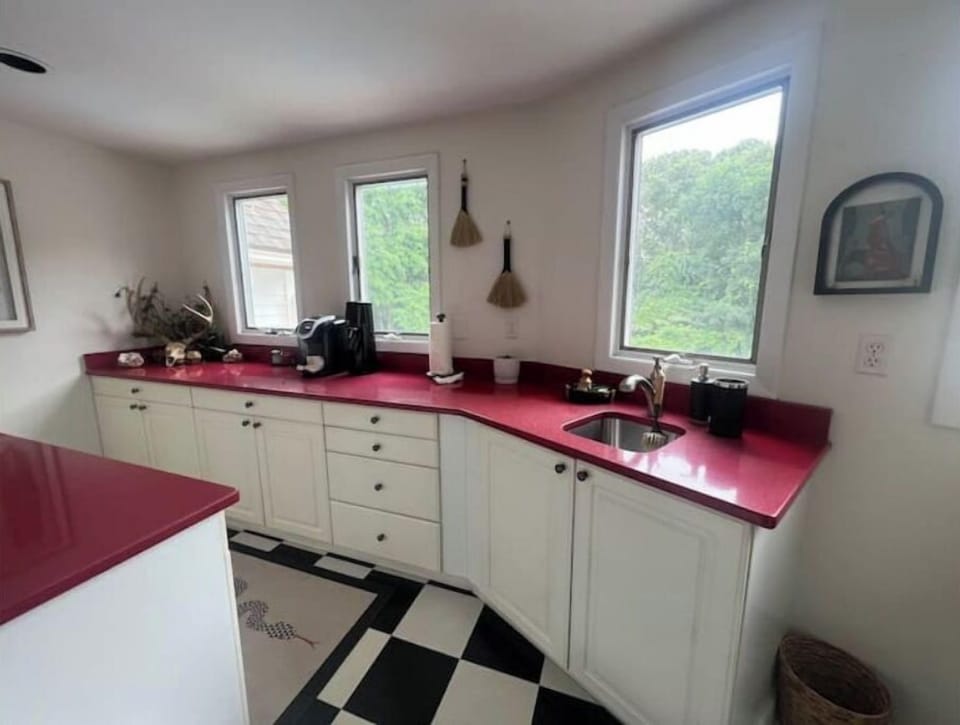Butler's pantry with Keurig coffee maker and a soda stream.