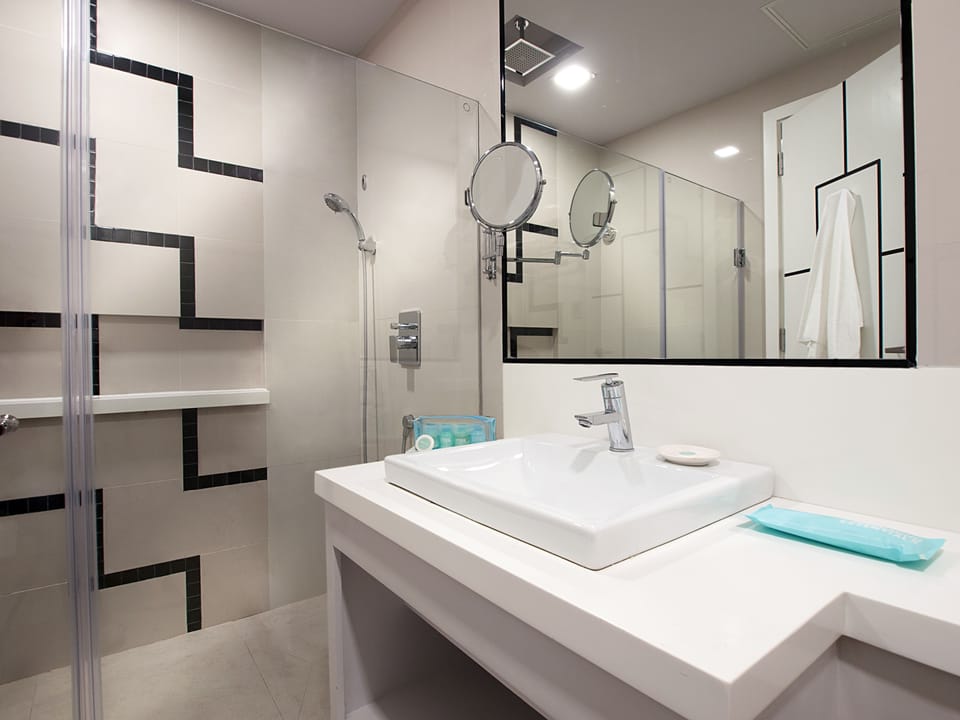 Shower, free toiletries, hair dryer, bathrobes