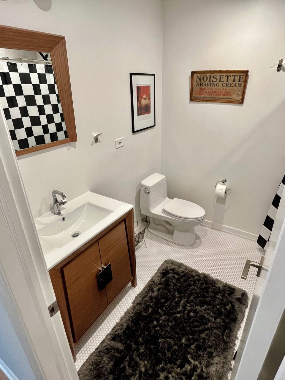 Guest bathroom.  In hallway.  Across from guest bedrooms 1 and 2