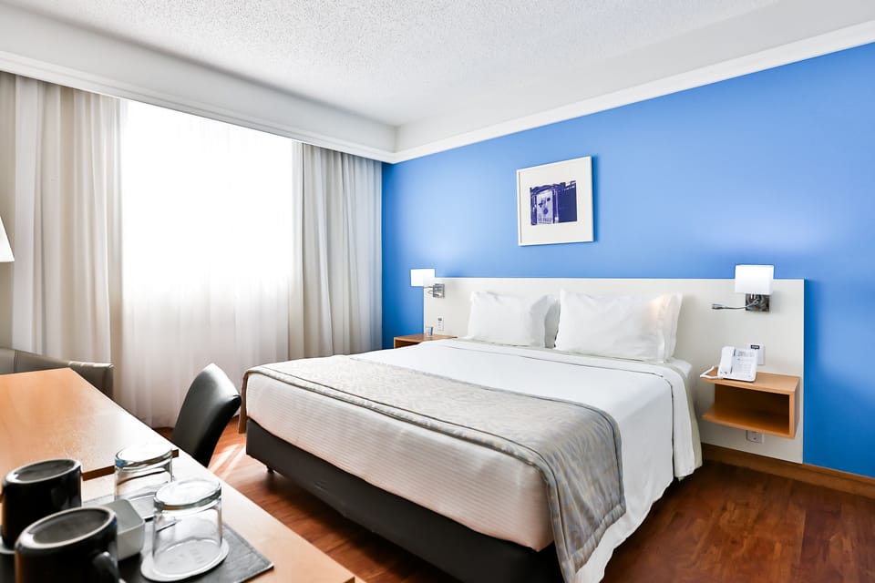 Deluxe Double Room, 1 Queen Bed | Minibar, in-room safe, desk, blackout drapes