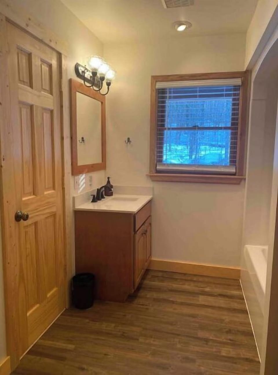 Primary en suite full bathroom with large walk in closet 