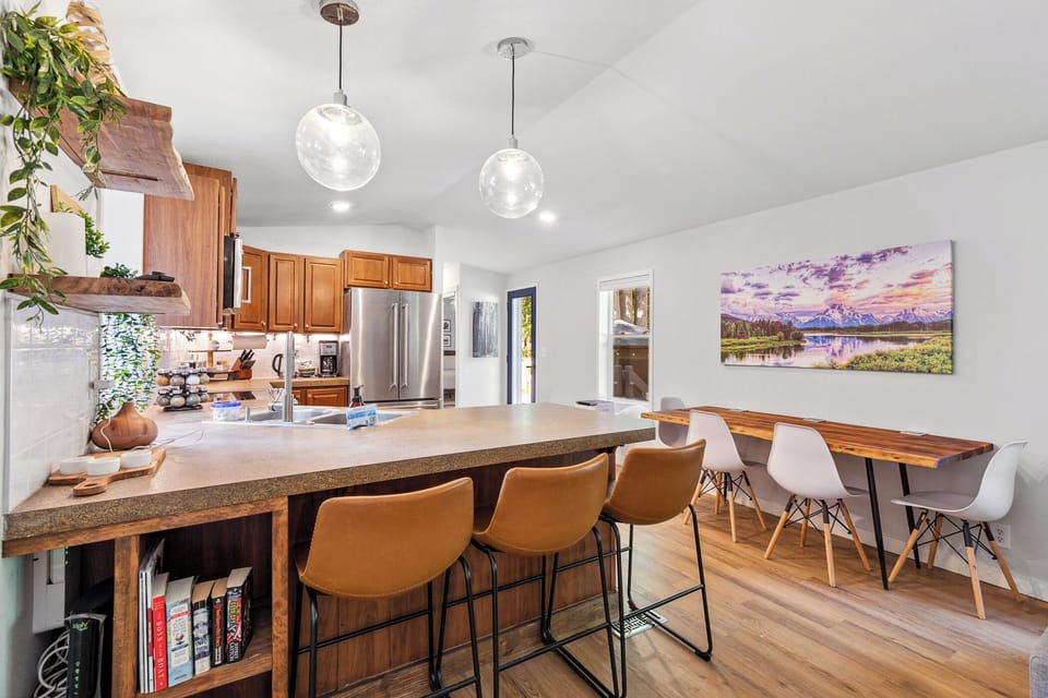 Stay connected with seating bordering the kitchen