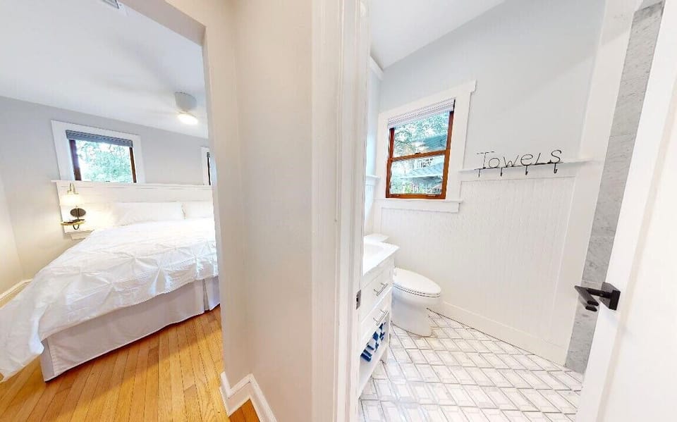 Bath with easy access to Greatroom or Master with Barn Door for privacy