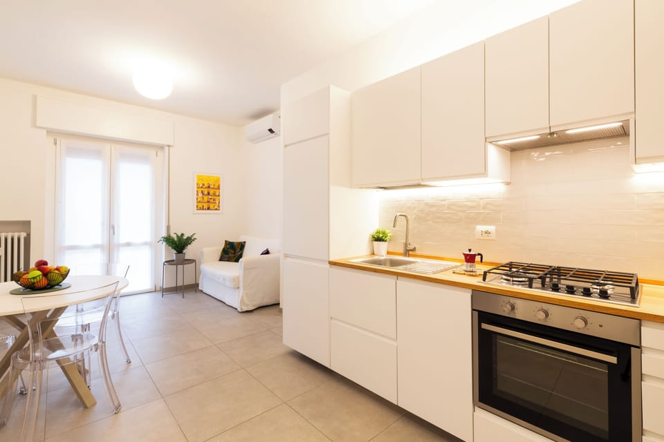 Panoramic Condo | Living area | 32-inch flat-screen TV with digital channels