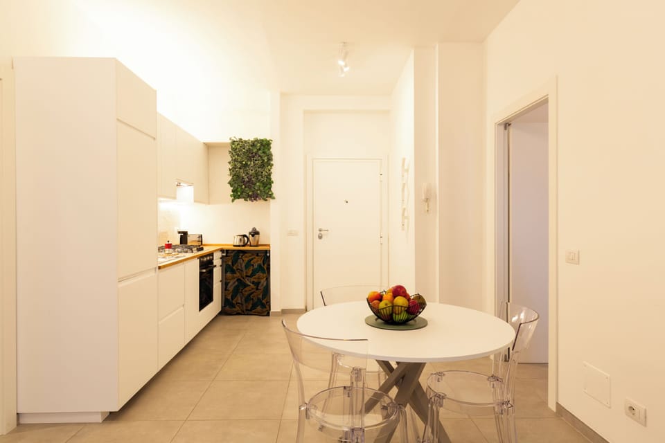 Panoramic Condo | Private kitchen | Full-size fridge, oven, stovetop, dishwasher