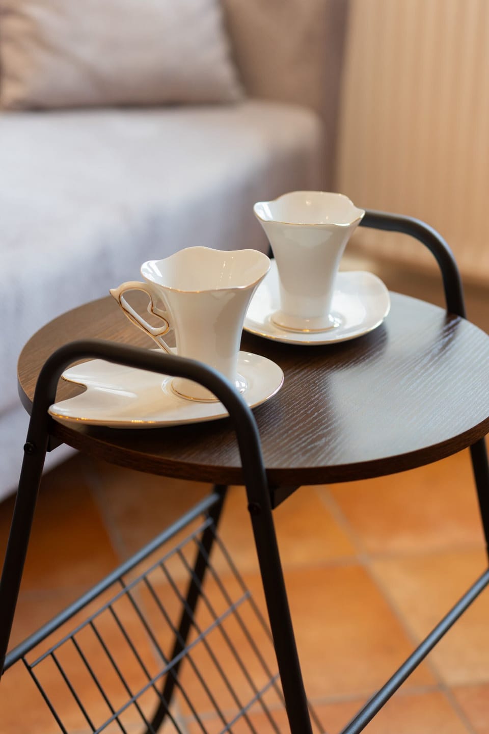 A close-up of a tray with two cups, adding a welcoming and homey touch to the space.
