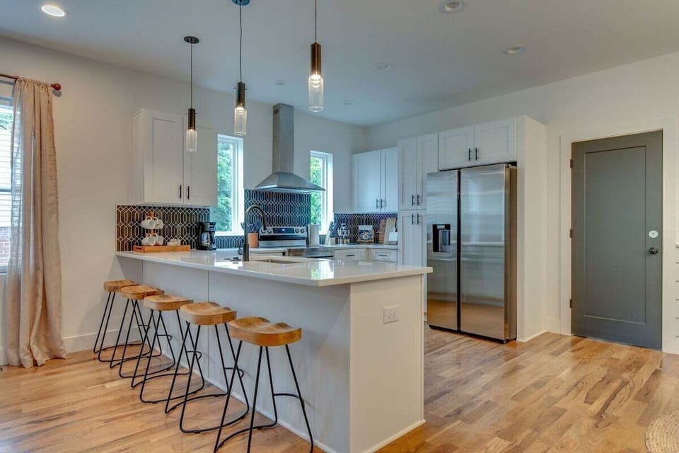 Kitchen area with bar seating