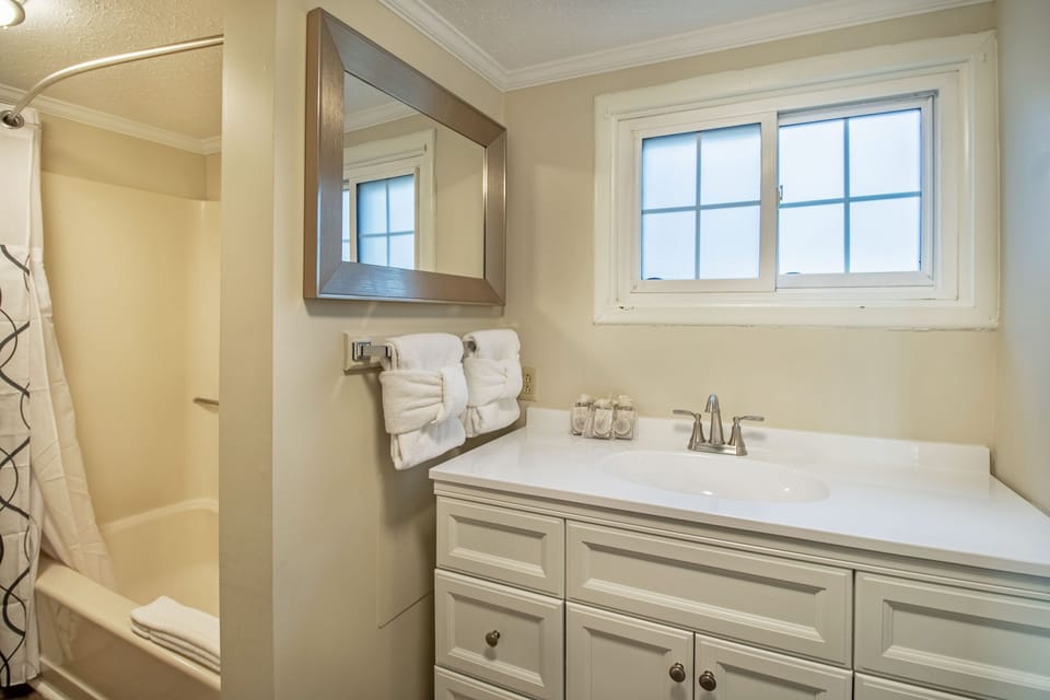 Private full bathroom located in Bedroom 1 