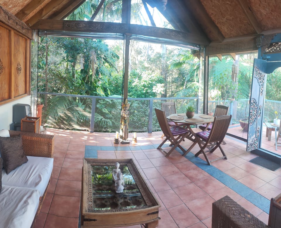 Magical Bali-style dining, reading, relaxing area overlooking bushland.