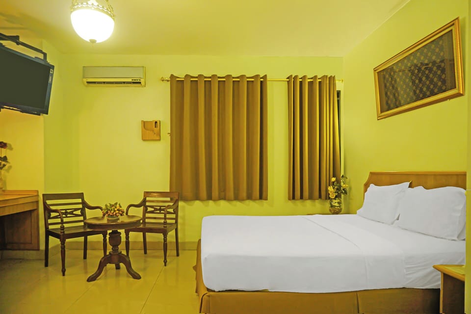Family Suite | Laptop workspace, WiFi (free), bed sheets