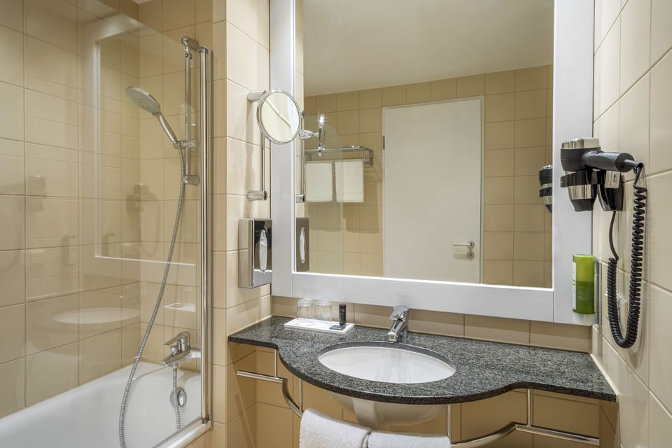 Bathtub, free toiletries, hair dryer, towels
