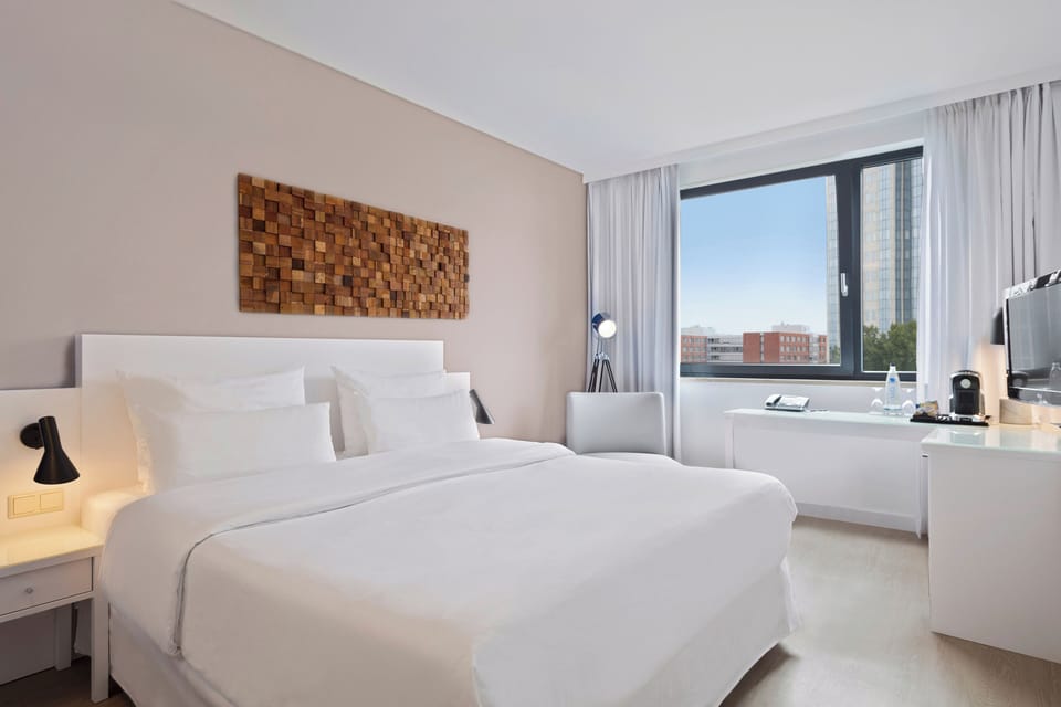 Premium Room | Hypo-allergenic bedding, blackout drapes, iron/ironing board, bed sheets