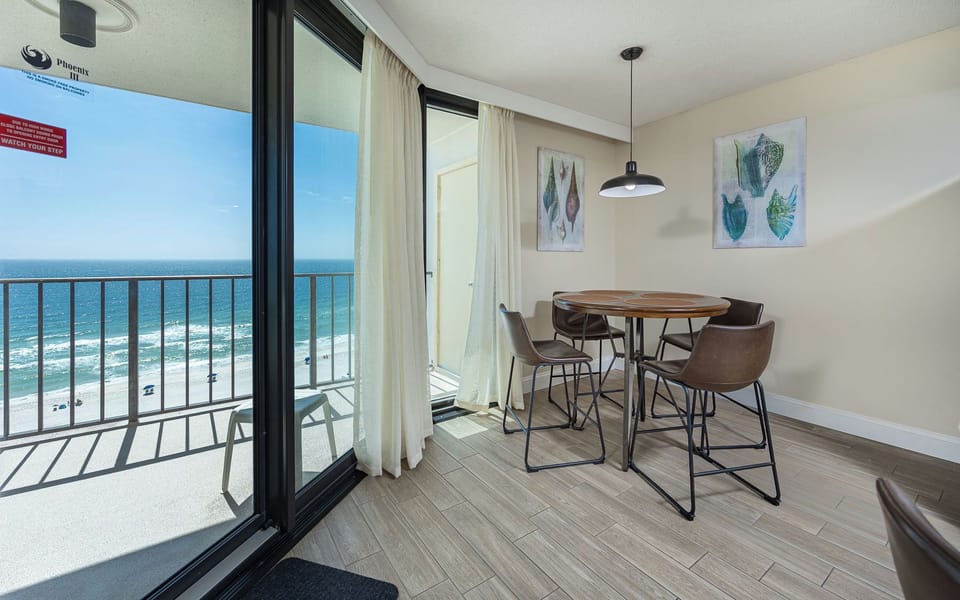 Sunlight warms the dining room as you plan your day beside the sparkling gulf coast views from your balcony